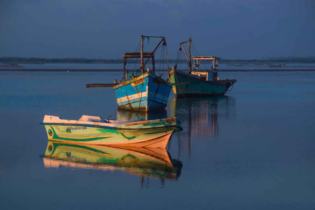 Fishing boats on calm water in northern Sri Lanka